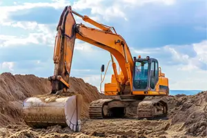 Excavator on a construction site fueled by Gassy mobile fuel delivery in Austin